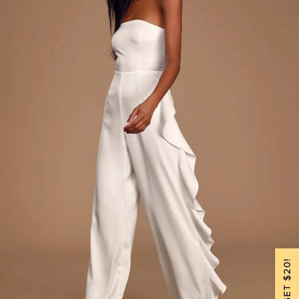White jumpsuit. Strapless.
